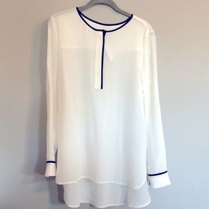 Ann Taylor 100% silk blouse. Cream with black trim. Size medium. New with tags